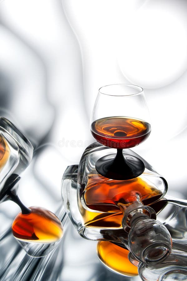 Brandy (whiskey), cognac in a bottle and glass